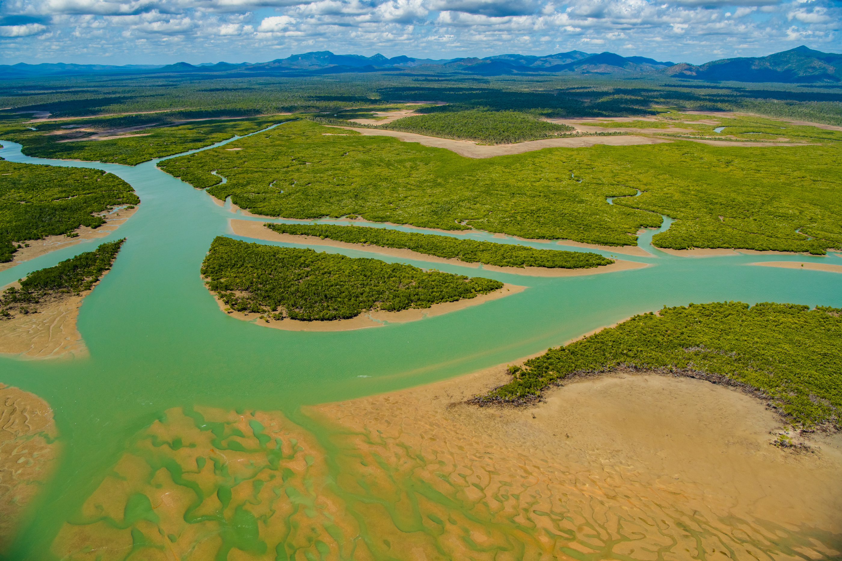 Mountains to the sea. Photo by Gary Cranitch © Queensland Museum