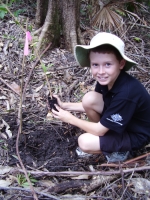 Josh planting a bottlebrush at Heritage Park