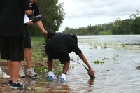 Children testing the water quality